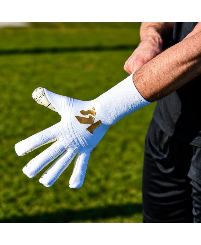 KEEPERsport Hero Elite Power guante de portero strapless blanco con detalles dorados